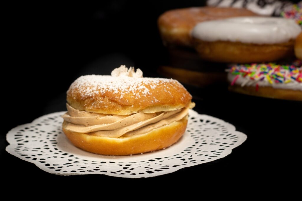 Raised Chocolate Cream Filled Puff Donuts