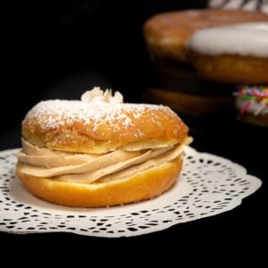 Raised Chocolate Cream Filled Puff Donuts