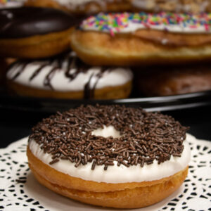 Iced Raised Ring Donuts with Chocolate Jimmies
