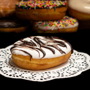 White Zebra Iced Raised Ring Donuts